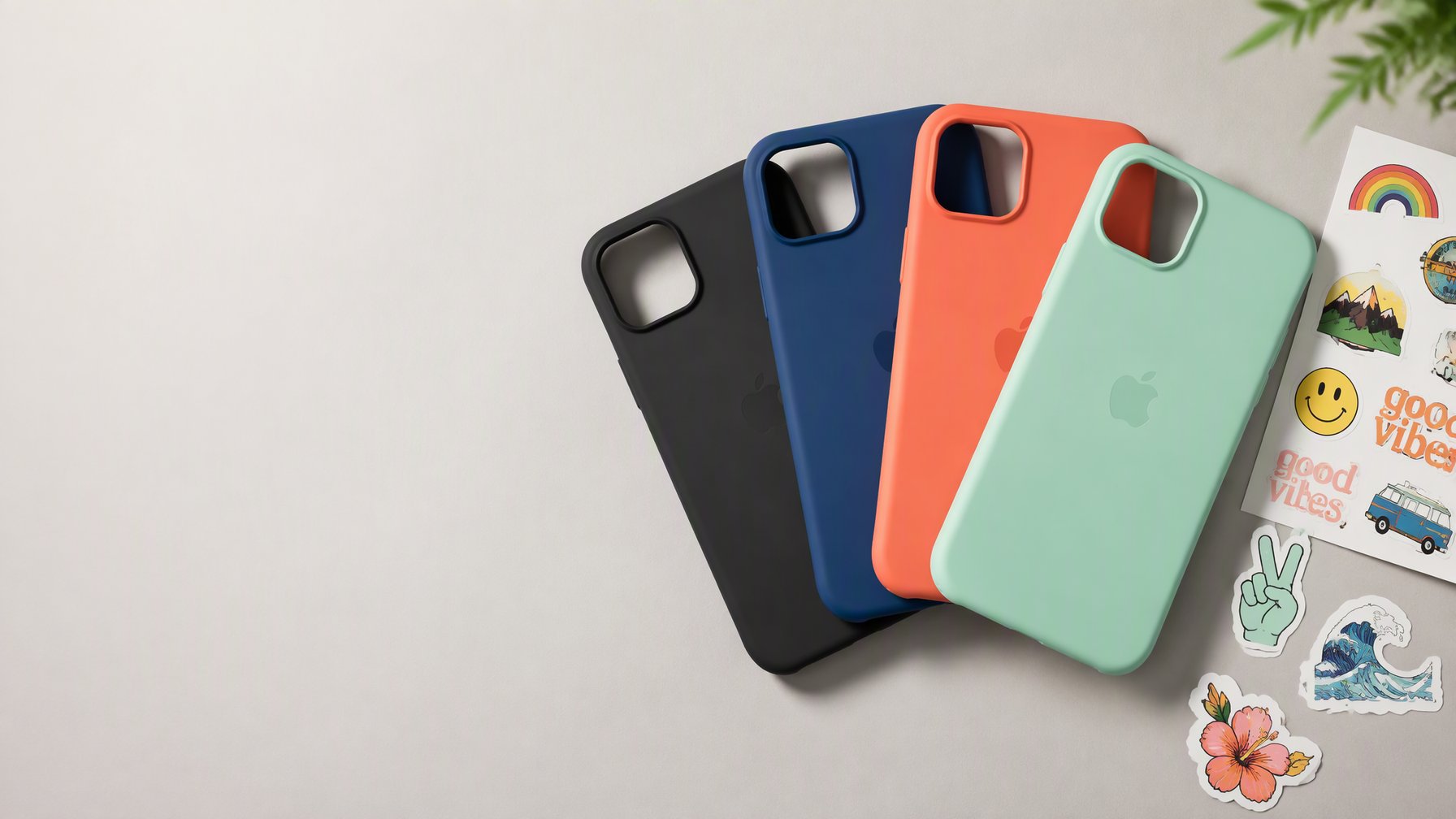 Colorful premium iPhone back covers fanned out with sticker sheets